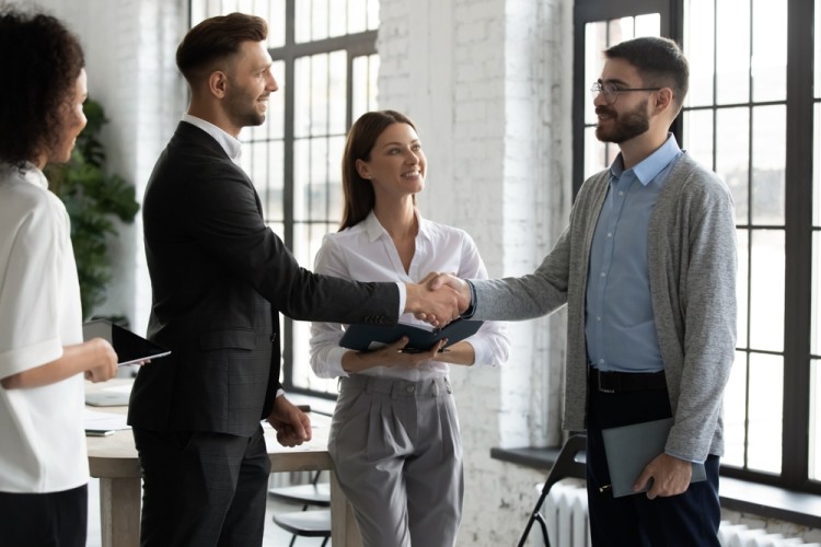 Clients visiting office and impressed by cleaned office