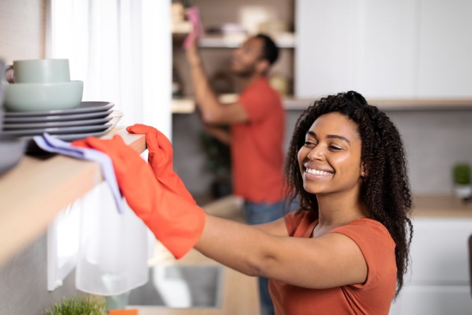 Professional cleaners cleaning kitchen area for bond back cleaning